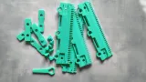 Modular cast-on comb segments and clips for Silver Reed 7GG