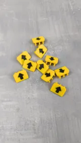 Yellow needle bed markers with black arrows