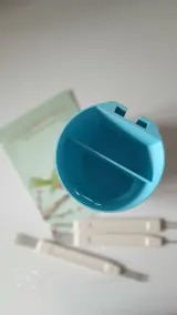 Blue cute tool organizer from above showing two compartments