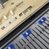 Needle position markers on a Brother bulky knitting machine
