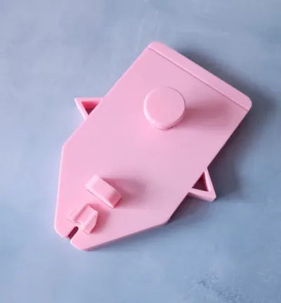 Pink 3D-printed drop stitch carriage for Brother 5gg knitting machines