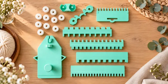 Mint 3D-printed machine knitting tools: needle selectors, cast-on comb, carriage and wax holders